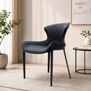 Black wing back leather dining chair with curved backrest and metal legs