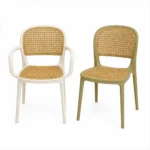 White rattan dining chair in a boho dining room setting